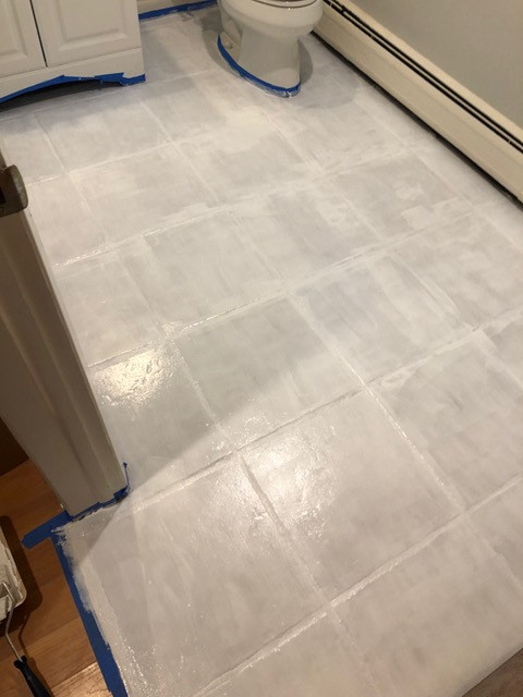 second coat of painted floor tile