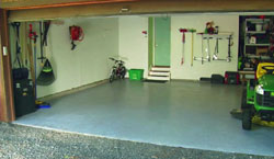 A concrete garage floor covered with Rustoleum's EpoxyShield