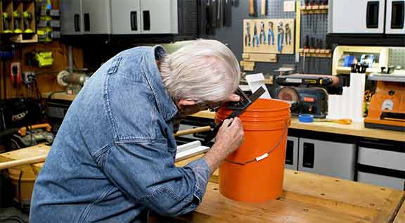 Man measuring making a mark
