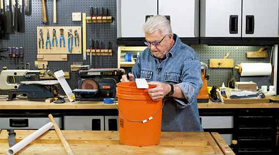 Man with bucket