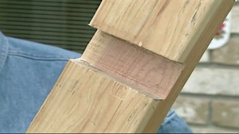 Home-made wooden deck board-straightening tool