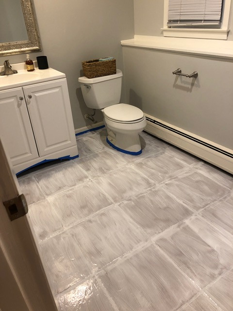 first coat of painted floor tile