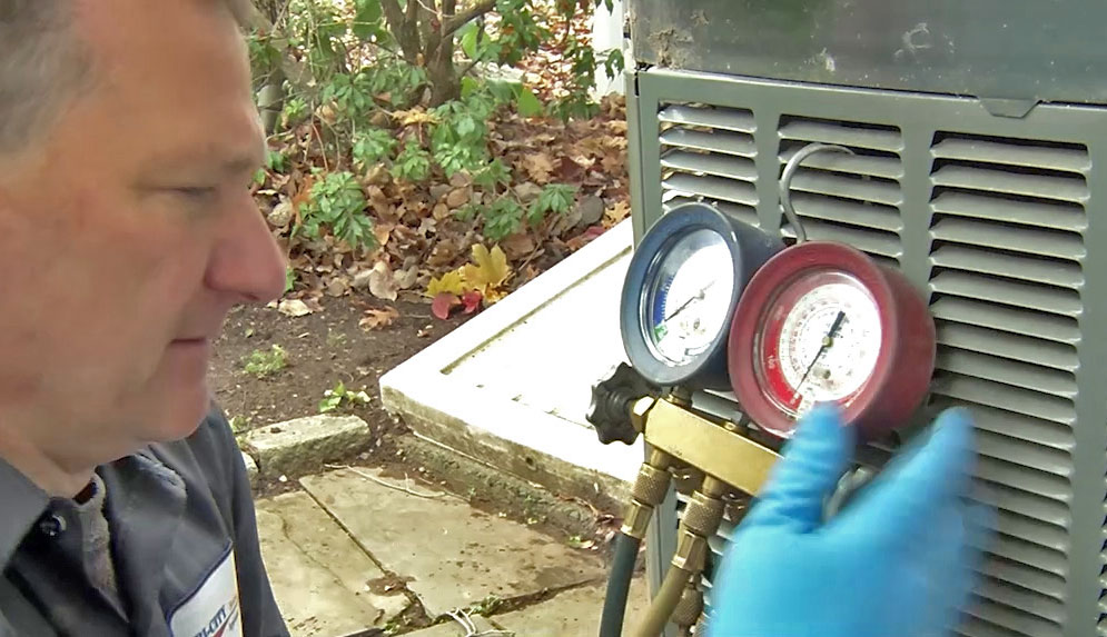 Technician checking the AC