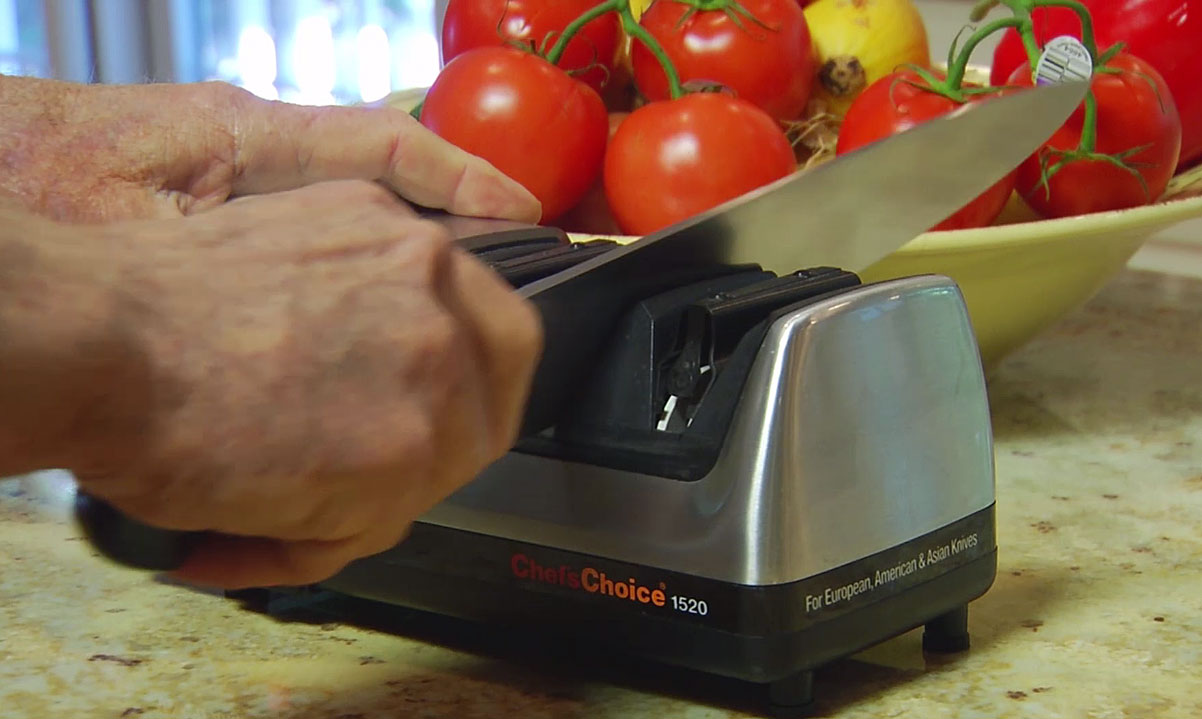 Images: Knife being sharpened using a Chef's Choice electric knife sharpener