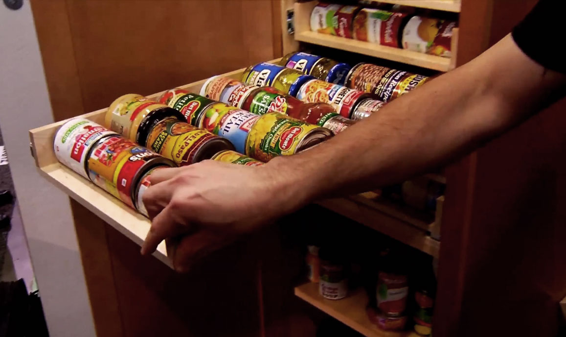 Pull out shelf for kitchen with cans 