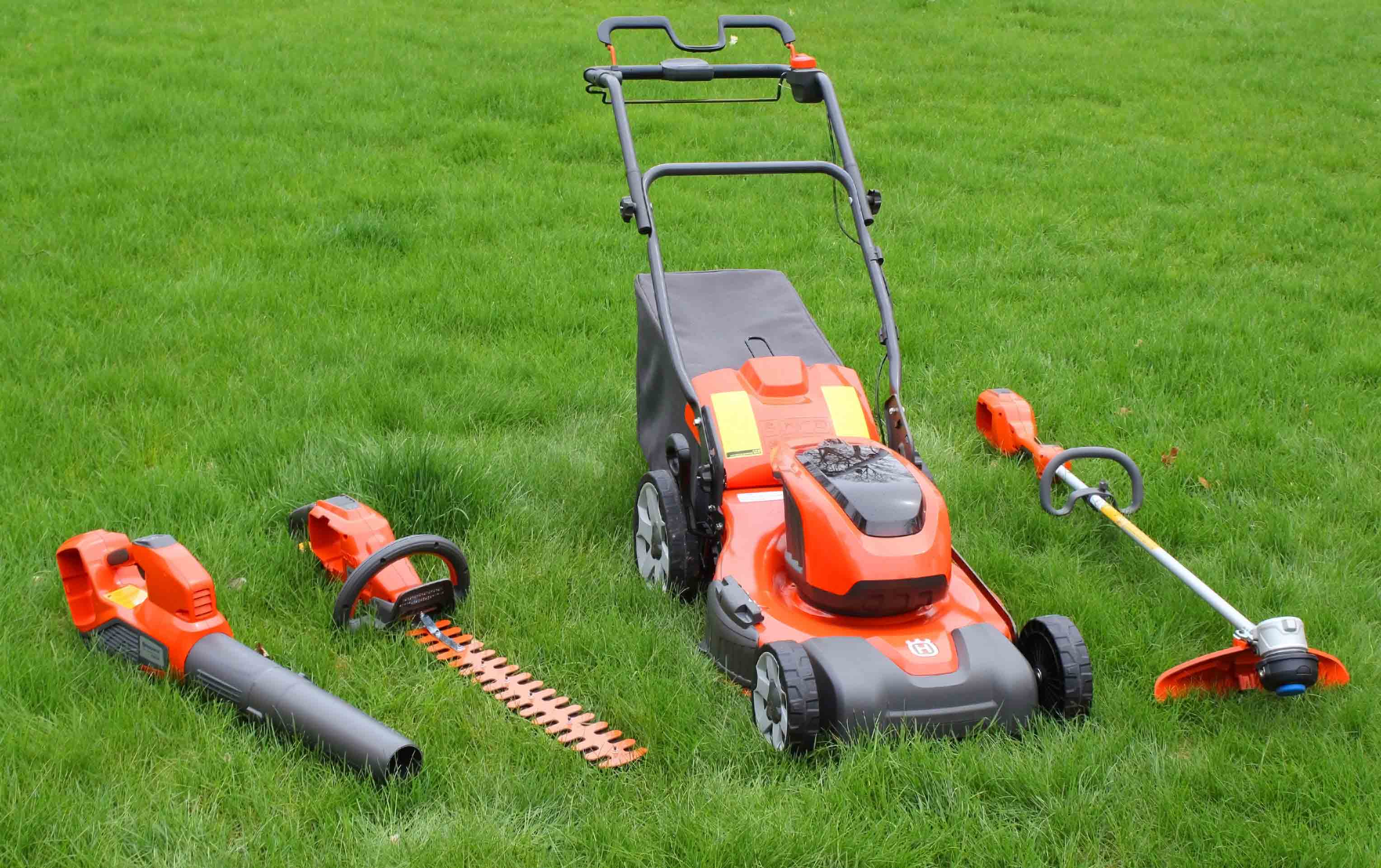 four Husqvarna lawn tools